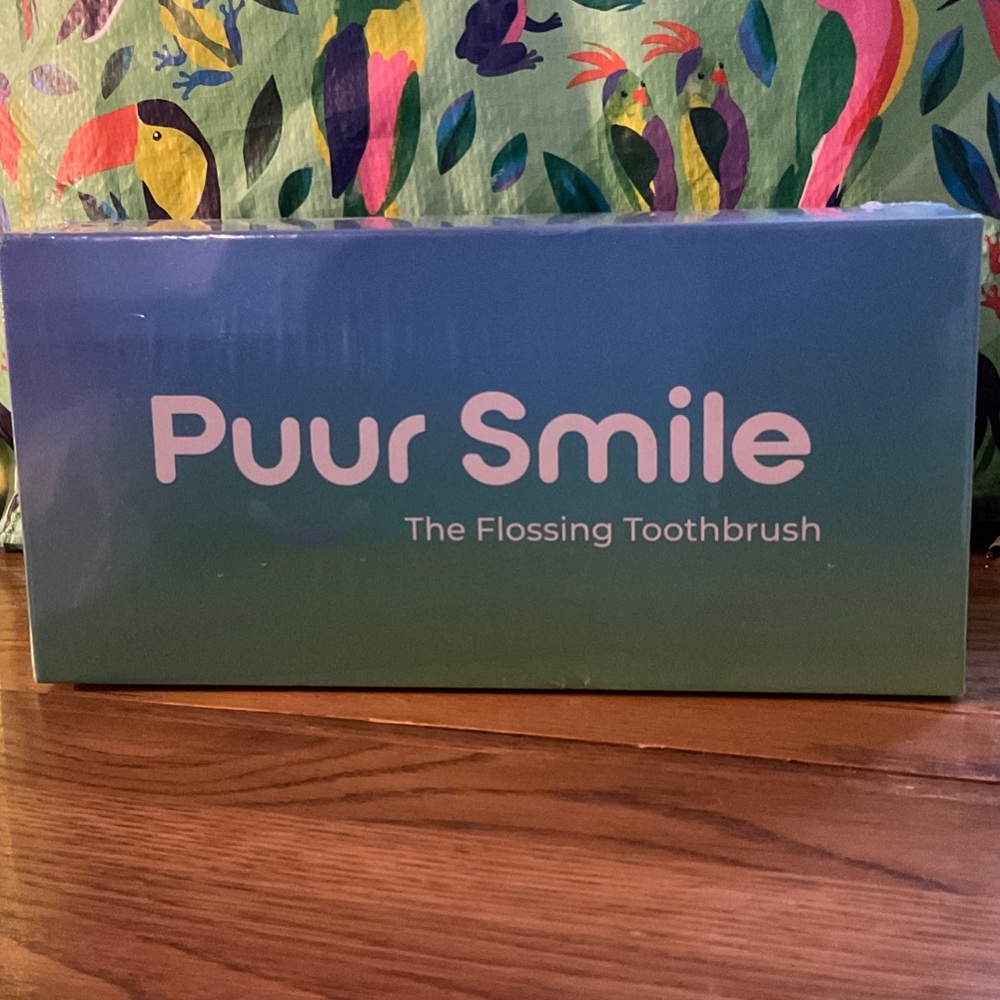 PUUR SMILE - THE FLOSSING TOOTHBRUSH